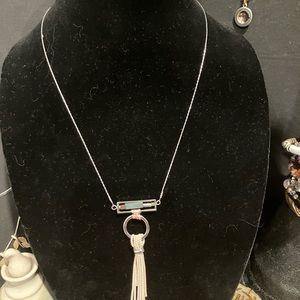 Handcrafted necklace with makers mark H